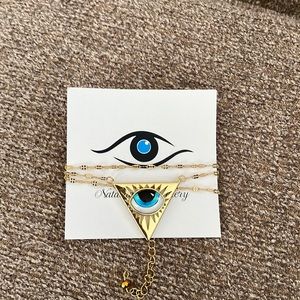 Natasa Oikonomou evil eye necklace